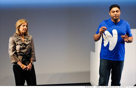 Former PayPal employees Stephanie Tilenius and Osama Bedier announce the launch of Google Wallet in New York, Thursday. PayPal is suing them, and Google, for stealing its trade secrets.